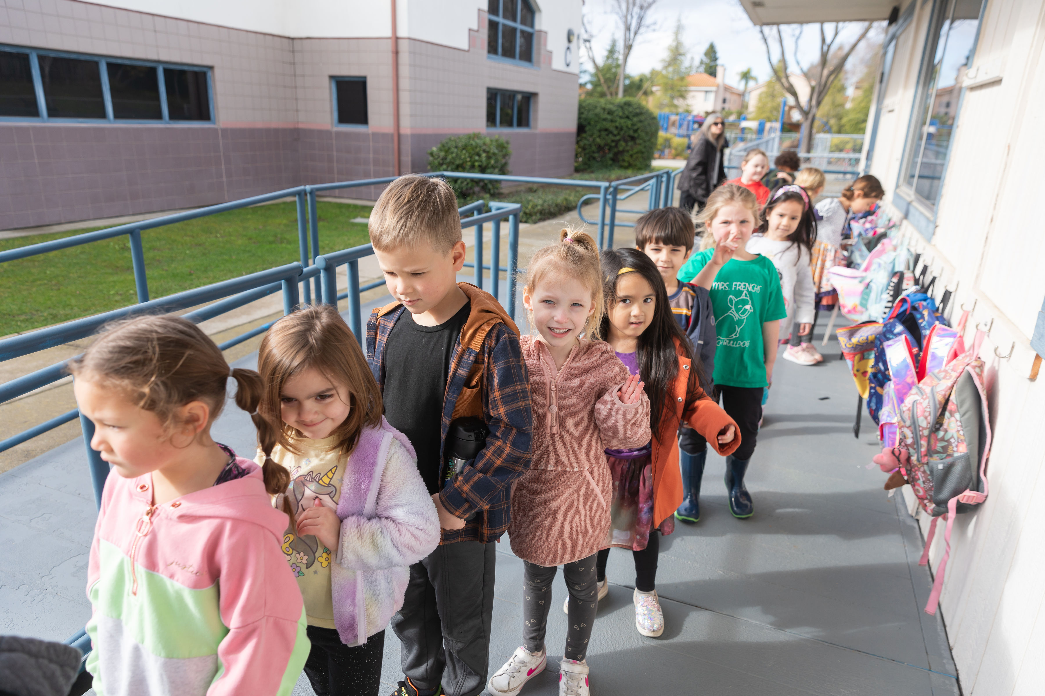 Students arriving to classroom.